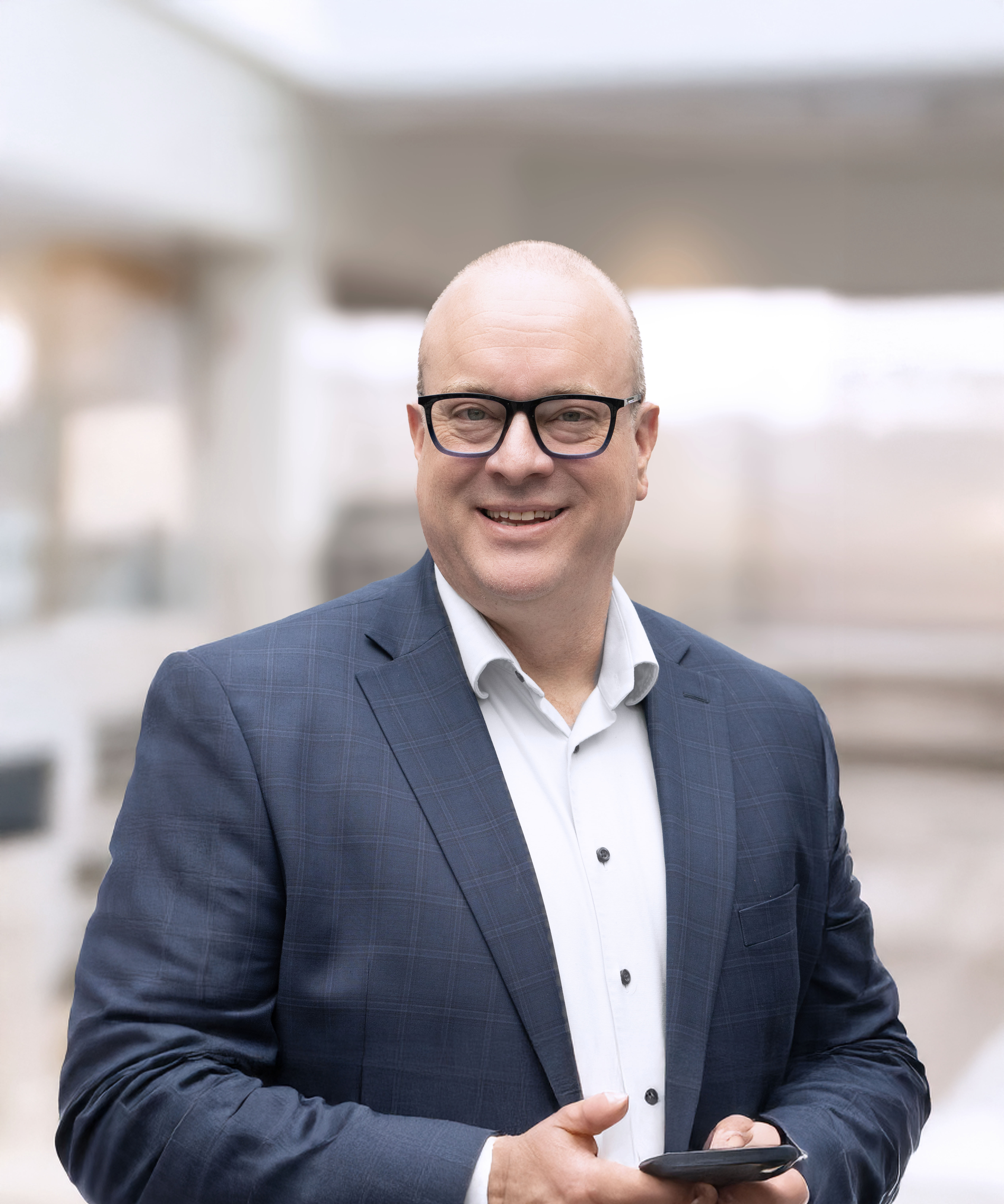 andrew cofield, Founder, with phone